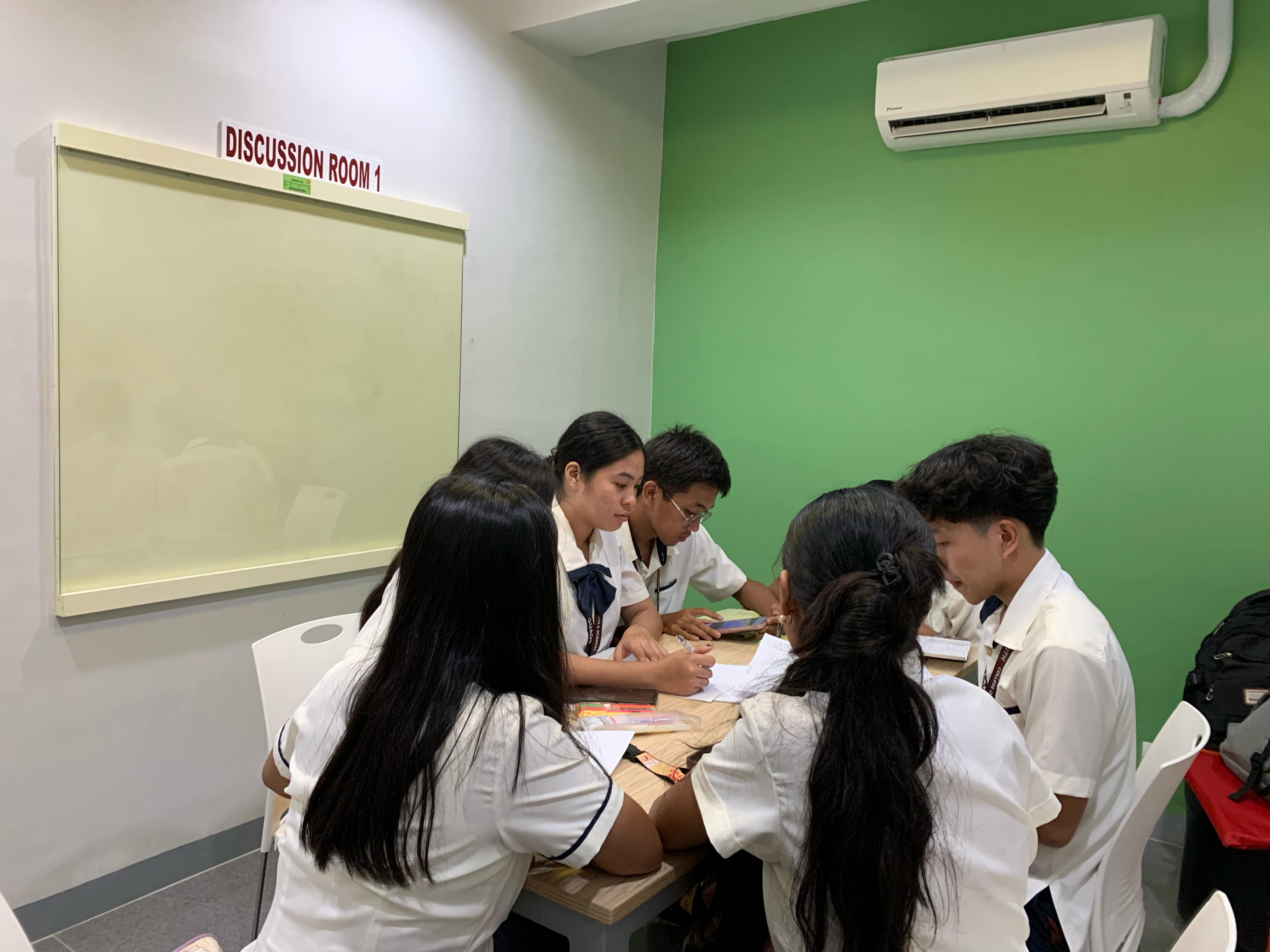 Students using the Discussion Room